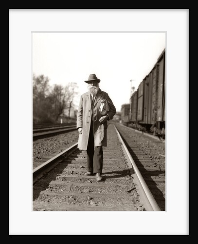 1930s Great Depression Era Man Homeless Hobo Walking Down Railroad Tracks by Anonymous