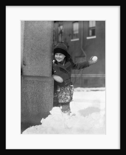 1930s Boy Peeking Around Side Building Throwing A Snowball Winter by Anonymous
