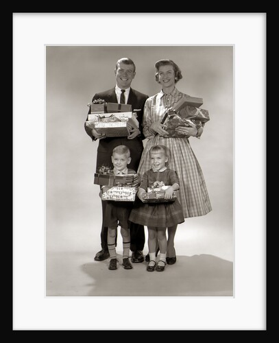 1950s 1950s Family Carrying Christmas Gifts Wrapped Presents by Anonymous