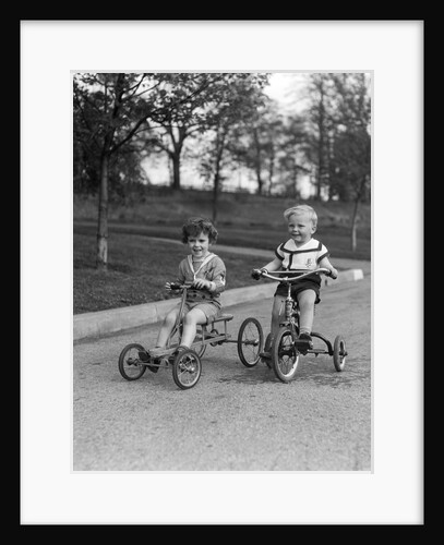 1930s Two Boys Riding Tricycles by Anonymous