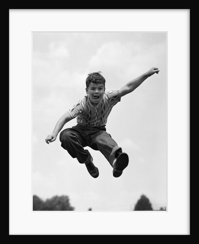 950s Boy Jumping Up by Anonymous