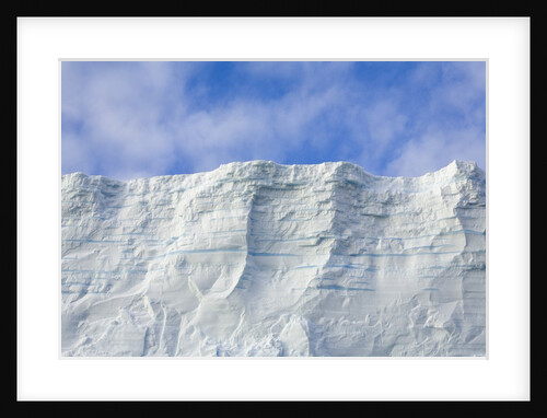 Blue Tabular Iceberg Sculpted by Waves by Anonymous