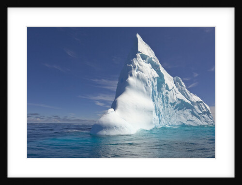 Pointy Blue Iceberg Sculpted by Waves by Anonymous