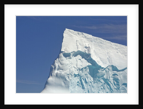 Pointy Blue Iceberg Sculpted by Waves by Anonymous