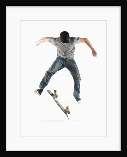Young Skateboarder Doing Trick by Anonymous