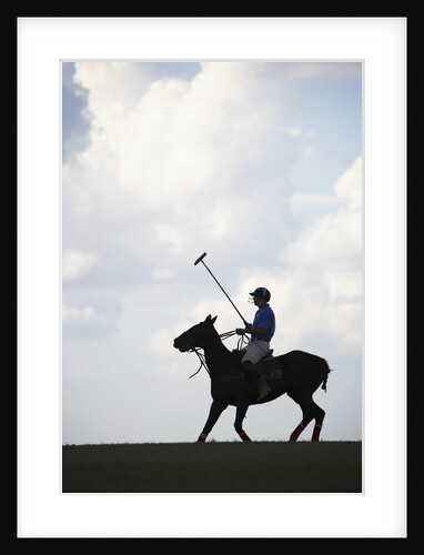 Polo player riding polo pony by Anonymous