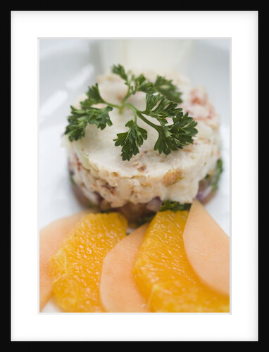 Crab and tropical fruit timbale with endive, melon and orange at The Sugar Mill, Tortola, British Virgin Islands by Anonymous