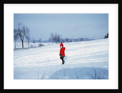 Germany - Bielefeld - 1960's child plays in snow by Anonymous
