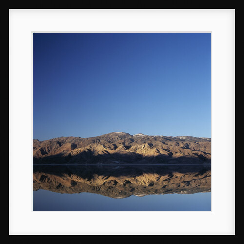 Brown Hills Reflected in a Lake by Anonymous