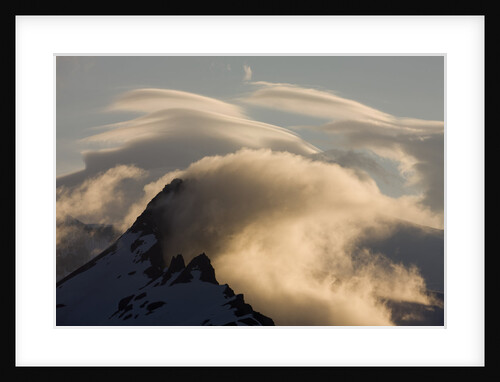 Cloud Covered Mountain Peaks at Sunset in Katmai National Park by Anonymous