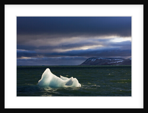 Setting Sun Lights Iceberg in Palanderbukta Bay by Anonymous
