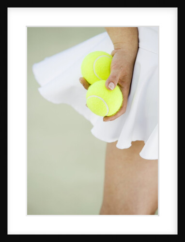 Woman Holding Tennis Balls by Anonymous