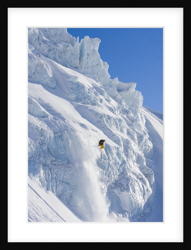 Skier going over edge of cliff by Anonymous