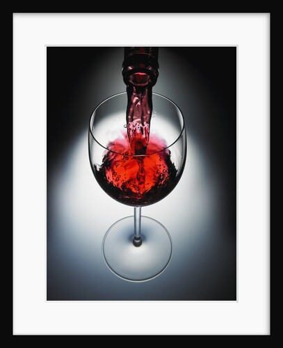 Wine poured in glass by Anonymous