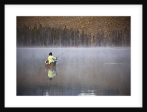 Man fishing on foggy lake by Anonymous
