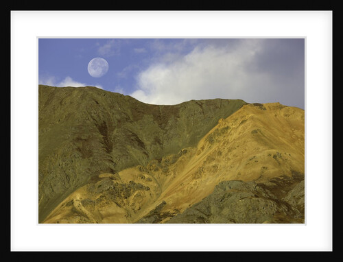 Full moon setting over mountain in Kluane National Park by Anonymous