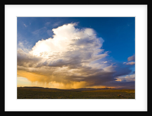 Rain clouds moving across landscape by Anonymous