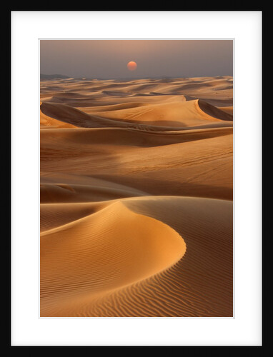 Sunset over the sand dunes in Dubai by Anonymous
