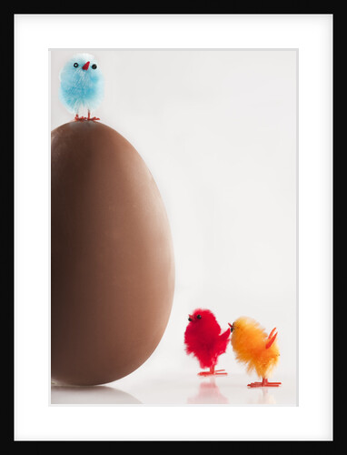 Tiny toy chicks by large chocolate egg by Anonymous