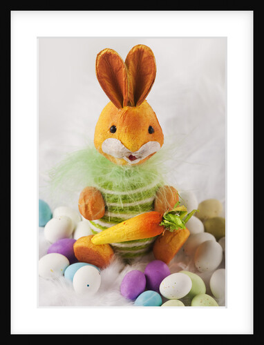 Toy bunny with candy eggs by Anonymous