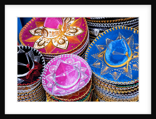Stacks of souvenir sombreros by Anonymous