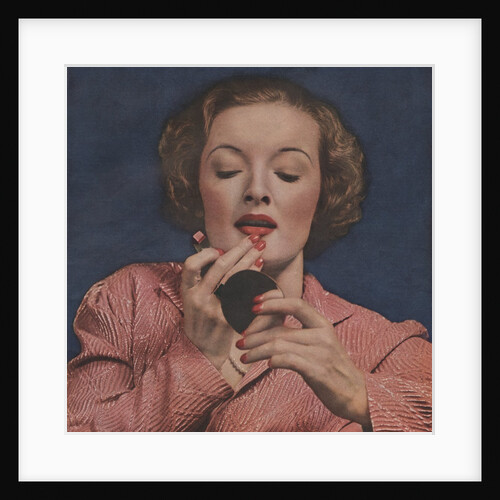 Woman putting on lipstick by Anonymous