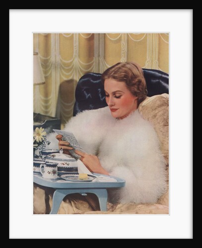 Woman reading letter in bed by Anonymous