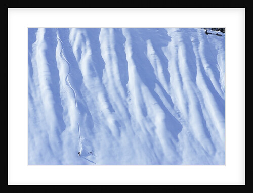 Man Snowboarding in the Backcountry of Roger's Pass, British Columbia, Canada. by Anonymous