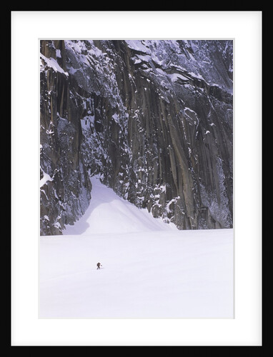 Backcountry Skier Underneath Snowpatch Spire, Bugaboos, British Columbia, Canada. by Anonymous