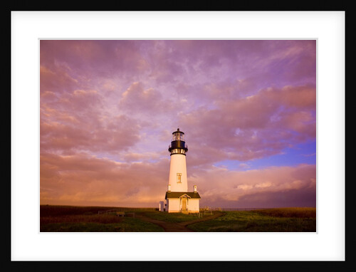 Yaquina Head lighthouse at sunrise by Anonymous