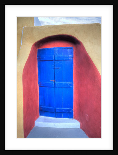 Colorful building in Oia on Santorini in the Greek Isles by Anonymous
