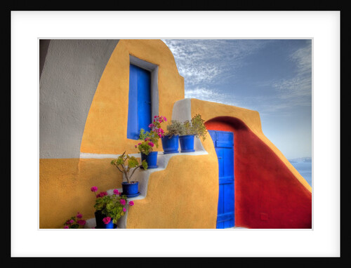Colorful building in Oia on Santorini in the Greek Isles by Anonymous