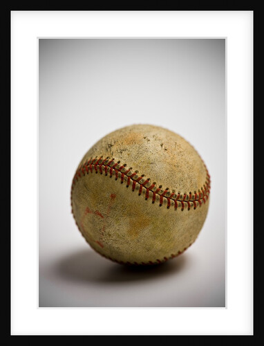 Close-up of worn baseball by Anonymous