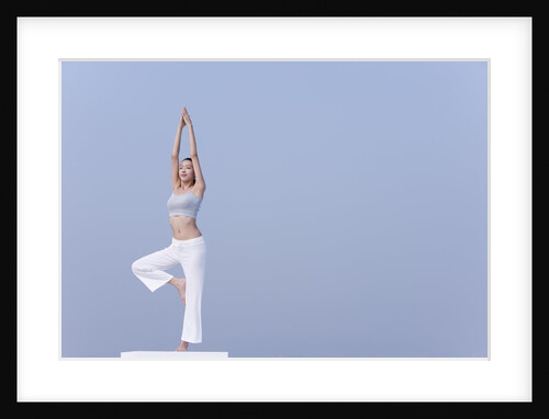 Young woman stretching by Anonymous