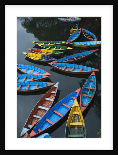 Canoes floating on water by Anonymous