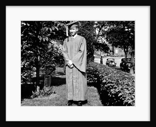 HIgh school grad poses in his cap and gown, ca. 1944 by Anonymous