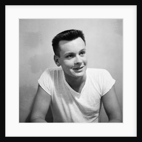 A skinny 21 year old boy in a portrait, ca. 1951 by Anonymous