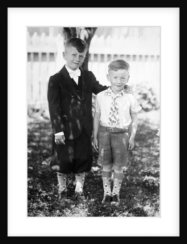 Two brothers pose in the backyard, ca. 1930 by Anonymous