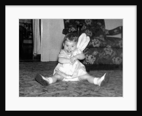 One year old girl hugs her bunny tight, ca. 1954 by Anonymous