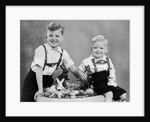Two brothers sit with Easter decorations, ca. 1948 by Anonymous