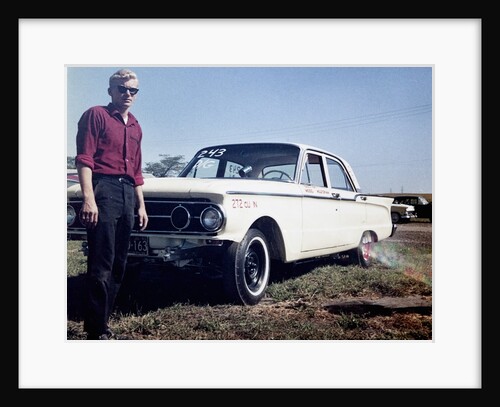 Sixteen year old boy stands with his 1960 Mercury Comet automobile, ca. 1962 by Anonymous