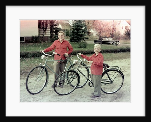 Two brothers stand with their new bikes in Wisconsin, ca. 1953 by Anonymous