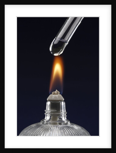 Test tube with liquid, over flame by Anonymous