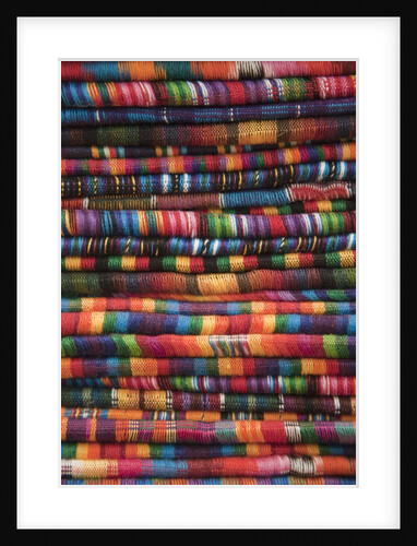 Textiles for sale in market in San Miguel de Allende by Anonymous