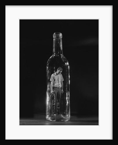 Sad man trapped inside bottle by Anonymous