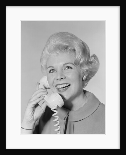 Portrait smiling stylish woman talking on telephone by Anonymous