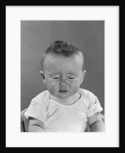 Portrait baby with eyes tightly closed by Anonymous