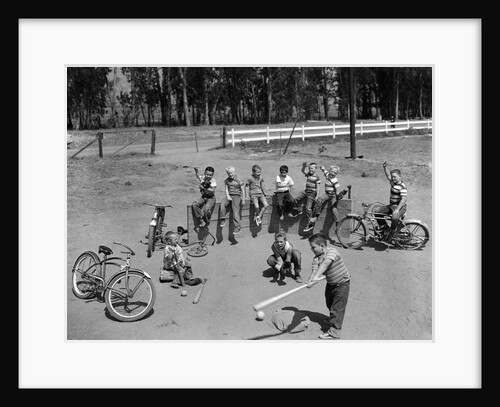 10 neighborhood boys playing sand lot baseball most wear blue jeans tee shirts by Anonymous