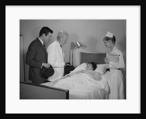 Doctor nurse husband talking with female patient in hospital bed by Anonymous