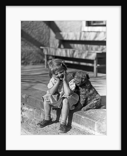 Little girl sitting on porch stoop funny expression hands up to her face beside her dog by Anonymous